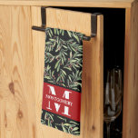 Family Monogram Christmas Holly Tea Towel<br><div class="desc">Your initial and last name personalise this kitchen towel with a branches,  berries and greenery pattern on black. Perfect for your home decor or give as a gift. MATCHING items in our store.</div>
