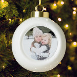Family Name and Photo Christmas Ceramic Ball Christmas Ornament<br><div class="desc">Custom-designed ceramic ball ornament featuring custom photo with family name and year.</div>
