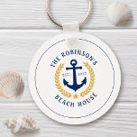 Family Name Beach House Anchor Gold Laurel Star Key Ring<br><div class="desc">A stylish nautical style metal keychain with your personalised family name and beach house, lake house, or other desired text and established date. Features a custom designed boat anchor with gold style laurel leaves and a star on white or easily customise the base colour to match your current decor or...</div>