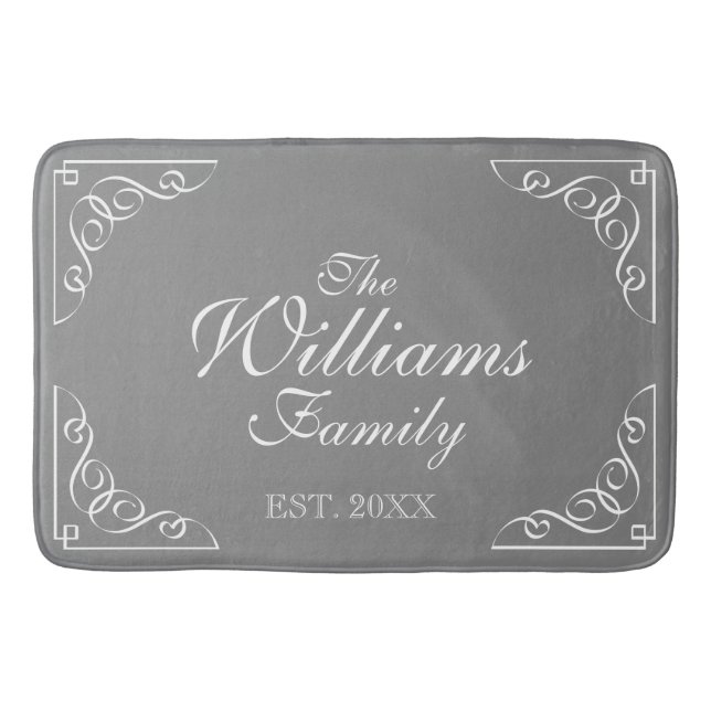 Family Name Est. grey bath mat with elegant swirls (Front)