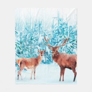 Family of noble deer in a snowy winter. Christmas Fleece Blanket