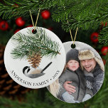 Family Photo Chickadee on Pine Sprig Christmas Ceramic Tree Decoration<br><div class="desc">This special family photo keepsake Christmas ornament features a cute little chickadee is perched on a pine cone on the front, with the family name and year, and a photo on the back. Easily customise the templates with your own text and photo. *If you need design assistance or matching products,...</div>