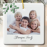 Family Photo Christmas  Ceramic Ornament<br><div class="desc">This Family Photo Christmas Ornament is decorated with watercolor mistletoe and stylish script typography. Easily customisable with your photo, name, and year. Use the Design Tool to change the text size, style, or colour. Because we create our artwork you won't find this exact image from other designers. Original Watercolor ©...</div>