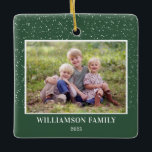 Family Photo Keepsake Snow Christmas Ceramic Ornament<br><div class="desc">This green Christmas ornament features a horizontal photo and is accented with a graphic of light snow. Personalise this square family ornament with your favourite photo,  name and year.</div>