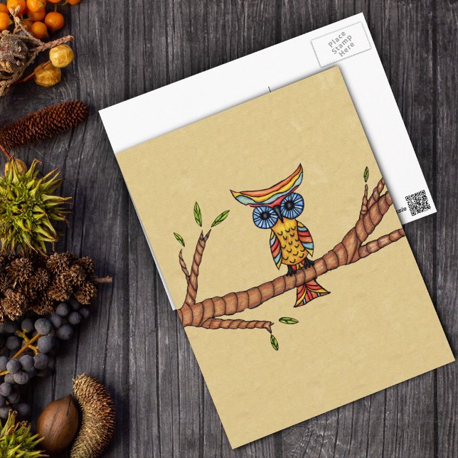 Fancy Colourful Owl Branch Postcard (Fantasy colourful owl blue eyes sitting on tree branch on tan postcard.)