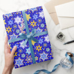 Fancy Stars of David Wrapping Paper<br><div class="desc">Colourfully patterned Stars of David dance on a field of deep blue.</div>