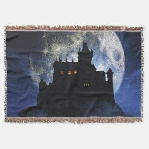 Fantasy castle during night throw blanket