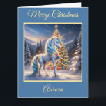 Fantasy Unicorn in a Christmas Winter Wonderland Card<br><div class="desc">A beautiful fantasy unicorn stands in front of an elegant Christmas tree in a magical winter wonderland in this festive Christmas card perfect for all the children on your Christmas list. Add your own personalised text.</div>