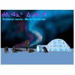 Far North Christmas - Kuvianak Innovia Photo Sculpture Magnet<br><div class="desc">A digital painting featuring an igloo on the polar ice pack, sled dogs and a man in a parka. The northern lights glow overhead. Kuvianak Innovia is Merry Christmas in the Inuktitut (Eskimo) language. Above the English text Kuvianak Innovia appears in the Inuktitut alphabet. The Inuit are commonly referred to...</div>
