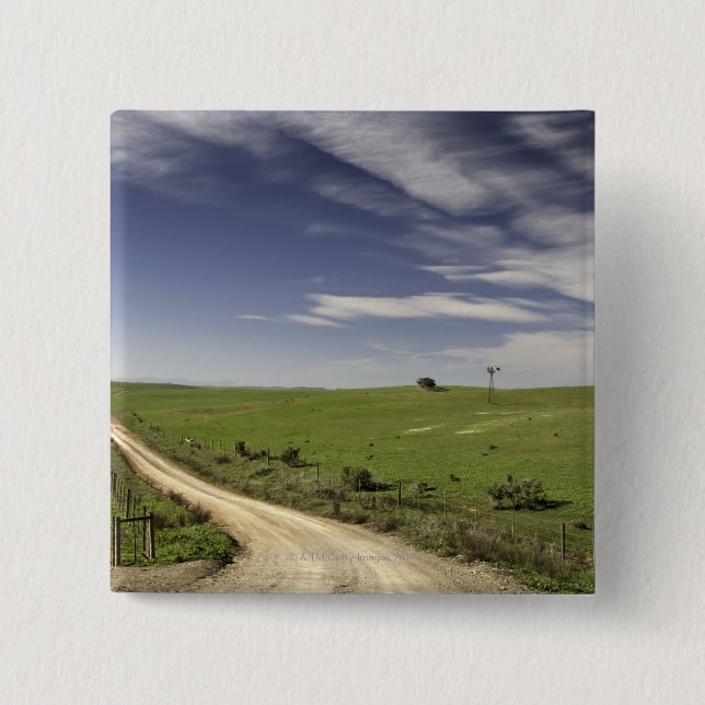 Farm road twining between wheat fields, Caledon, 15 Cm Square Badge (Front)
