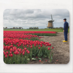 Farmer inspecting his tulips and windmill mouse mat