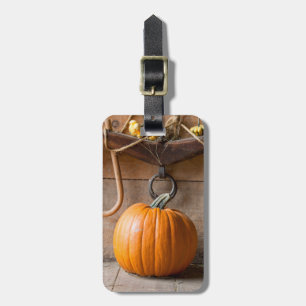 Farmers Museum. Pumpkin in barn with bale of hay Luggage Tag