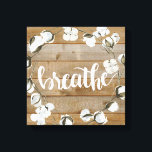 Farmhouse Inspiration - Breathe Canvas Print<br><div class="desc">Farmhouse Inspiration II by Jennifer Paxton Parker. Features the word "Breathe" in cursive alongside a cotton wreath and wood plank background.</div>