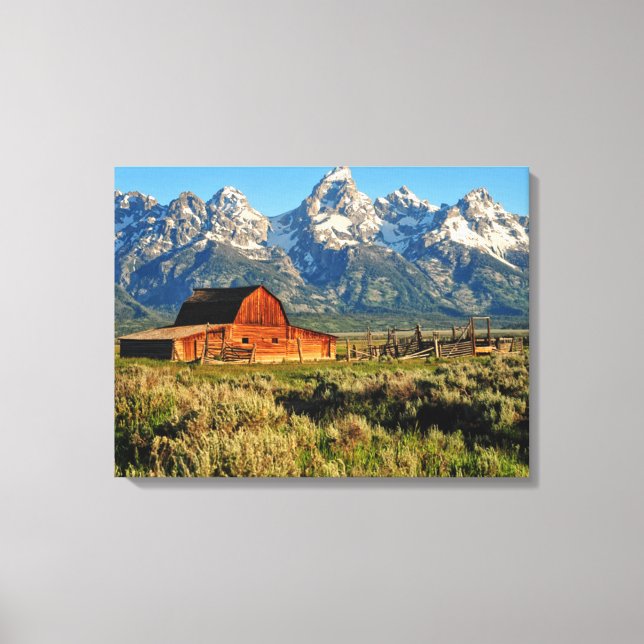 Farms | Barn Shadowed by Snow Capped Mountains Canvas Print (Front)
