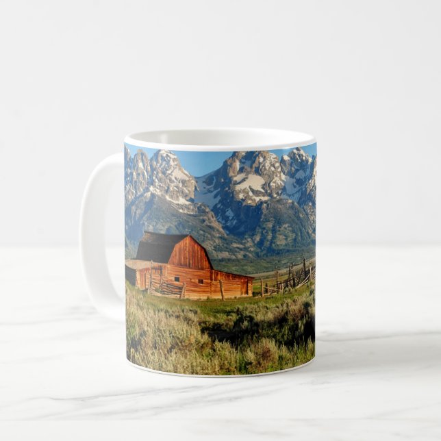 Farms | Barn Shadowed by Snow Capped Mountains Coffee Mug (Front Left)