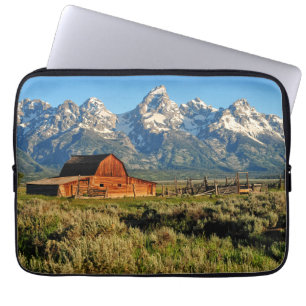 Farms Barn Shadowed by Snow Capped Mountains Laptop Sleeve