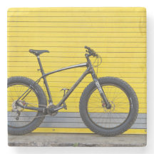 Fat bike on yellow wall