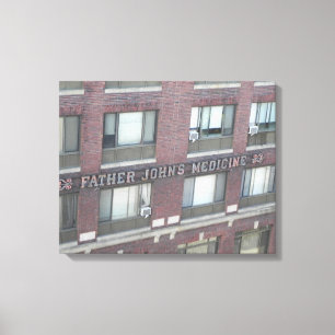 FATHER JOHN'S MEDICINE BUILDING WRAPPED CANVAS PRINT
