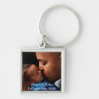 father's day father kissing infant tender sweet