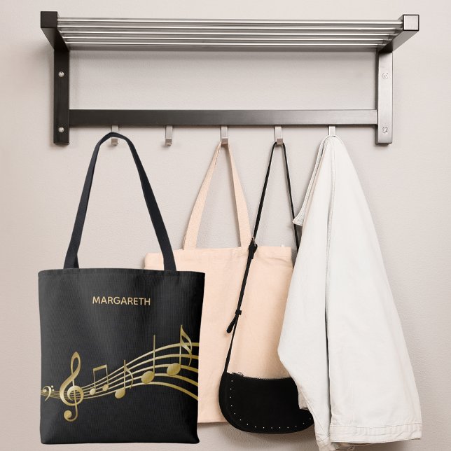 Faux gold music notes on a chic black backdrop tote bag (Creator Uploaded)