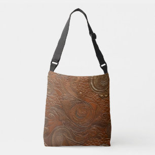 Faux leather, dyed tooled leather  crossbody bag
