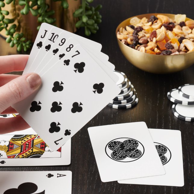 FEATHER MAGNET OF FALCON WITH UNEVENNESS ON THREAD PLAYING CARDS (In Situ)