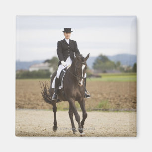 female dressage rider exercising magnet