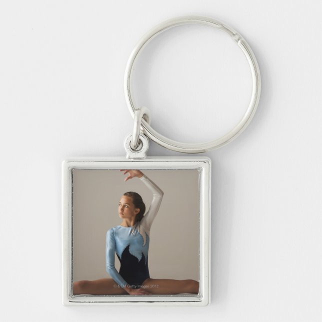 Female gymnast (12-13) performing splits key ring (Front)