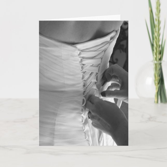 Female hand lacing up wedding dress back card (Front)