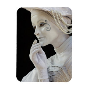 Female mime performing on street corner magnet