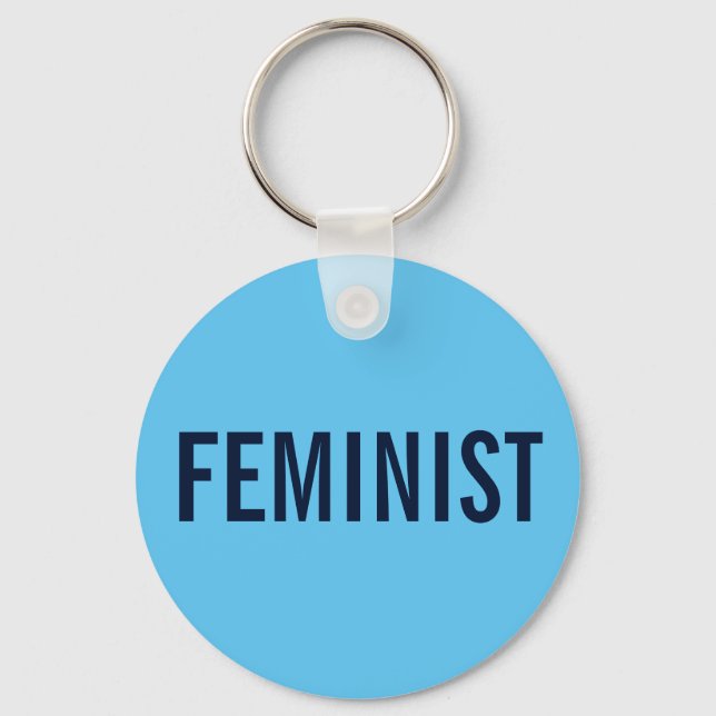 Feminist, bold navy text on sky blue key ring (Front)