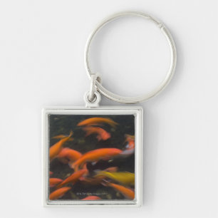 Feng Shui believe koi fish bring good luck. Key Ring