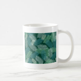 Fern leaves pattern on dark green coffee mug