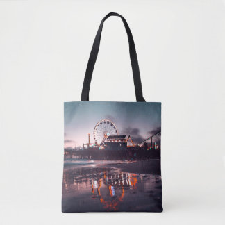 Ferris wheel during golden hour tote bag