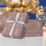 Festive Blush Pink Gold Nutcracker Christmas Dark Wrapping Paper<br><div class="desc">Wrap your holiday gifts in style with our exclusive Pink and Gold Nutcracker Christmas Wrapping Paper. Perfect for adding a touch of elegance and festivity to your holiday season, this high-quality wrapping paper features a unique design with classic Nutcracker motifs in a stunning pink and gold colour scheme. Ideal for...</div>