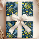 Festive Hanukkah Menorah & Sukkot Pattern Wrapping Paper<br><div class="desc">Description: Celebrate the Festival of Lights with this joyful Hanukkah wrapping paper! Featuring a delightful pattern of menorahs, dreidels, and sukkot stars, this colourful design is perfect for adding a touch of festive cheer to your Hanukkah gifts. The whimsical illustrations and vibrant colours will delight both children and adults alike....</div>