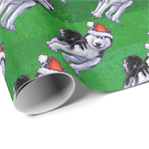Festive Husky in Santa Hat on Green Wrapping Paper