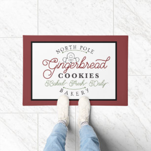 Festive North pole gingerbread bakery Doormat