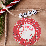 Festive Red and White Candy Canes Christmas Classic Round Sticker<br><div class="desc">Add a touch of festive cheer to your holiday gifts with our customisable Christmas sticker. This round sticker features a vibrant red background adorned with whimsical red and white candy canes with 3D effect, creating a joyful Christmas atmosphere. At the heart of the design is a beautifully written 'Merry Christmas'...</div>