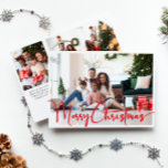 Festive Red Script Merry Christmas Four Photo Holiday Card<br><div class="desc">Celebrate the season with this festive red script Merry Christmas four photo holiday card featuring a touch of elegant charm. The chic design showcases a simple red-and-white colour palette, evoking the cosy spirit of winter. Its modern and unique appeal and rustic wording create a perfect balance between seasonal and contemporary....</div>