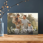 Festive Script Overlay Hanukkah Photo Holiday Card<br><div class="desc">Simple and chic Hanukkah photo card features your favourite family photo overlaid with "Happy Hanukkah" in white modern script lettering. Personalise with your family name and the year along the bottom. Cards reverse to a snow and stars pattern in rich navy blue and white.</div>