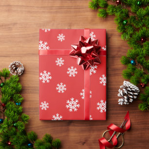 Festive Snowflake Pattern on Red Background Wrapping Paper