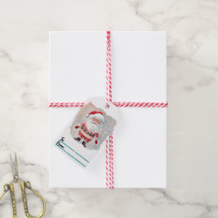 Festive tags with jolly Santa Claus