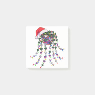 Festive Tropical Houseplant Wearing a Santa Hat Post-it Notes