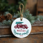 Festive Vintage Red Car Christmas Tree Monogram Ceramic Tree Decoration<br><div class="desc">Celebrate the magical and festive holiday season with our custom holiday ornament. The design features a red and green rustic hand-drawn etched style vintage car carrying a Christmas tree on top. Christmas greenery and foliage create a modern, rustic festive design. Customised with your initial. last name and year. The reverse...</div>