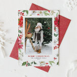 Festive Winter Floral Pattern Christmas Photo Holiday Card<br><div class="desc">Merry Christmas! Give warm holiday greetings to your family and friends with this customisable photo Christmas flat card. It features watercolor botanical pattern of red poinsettia, winterberries, holies, paperwhites and greenery accents. Personalise this watercolor Christmas card by adding your own details. This floral Christmas card is available in a variety...</div>