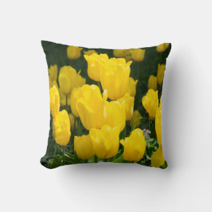 Field of bright yellow tulips cushion