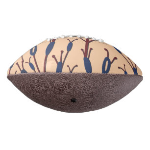 Field of Cat Tails against a Peach Background American Football