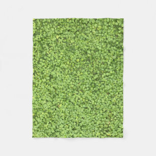Field of green plant fleece blanket