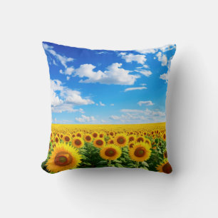 Field of sunflowers under blue sky, vibrant summer cushion